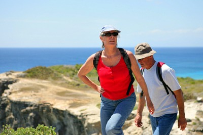 Couple Hikinh Along The Beach At Molera State Park